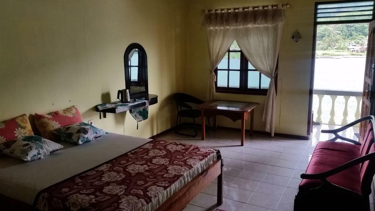 Sibayak Guesthouse Tuktuk Siadong Exterior foto